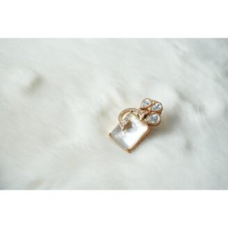 White Brooch Golden Earrings