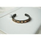 Black and Gold Channel Logo Cuff Bracelet