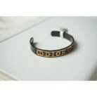 Black and Gold Dior Logo Cuff Bracelet