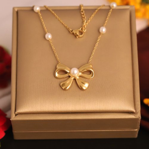 1N57Ei-UpL2JlOnzUhe0dEWx0iV1vZpIa.jpg 22k Gold Plated Pearl Bow Charm Necklace