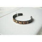 Black and Gold Channel Logo Cuff Bracelet