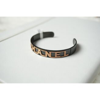 Black and Gold Channel Logo Cuff Bracelet