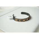 Black and Gold Channel Logo Cuff Bracelet