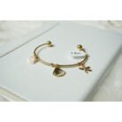 Gold Sea Shell Charm Bracelet