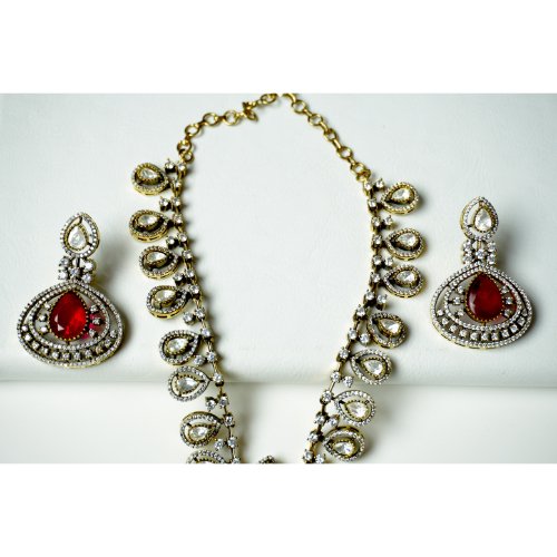 1jWg3hmDQEdfTh4ZiIvke1qwkIV2B-eBM.jpg Ruby Polki Droplet Necklace Set