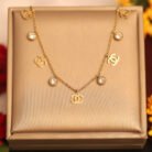 22k Gold Plated Chanel & Zirconia Charm Necklace